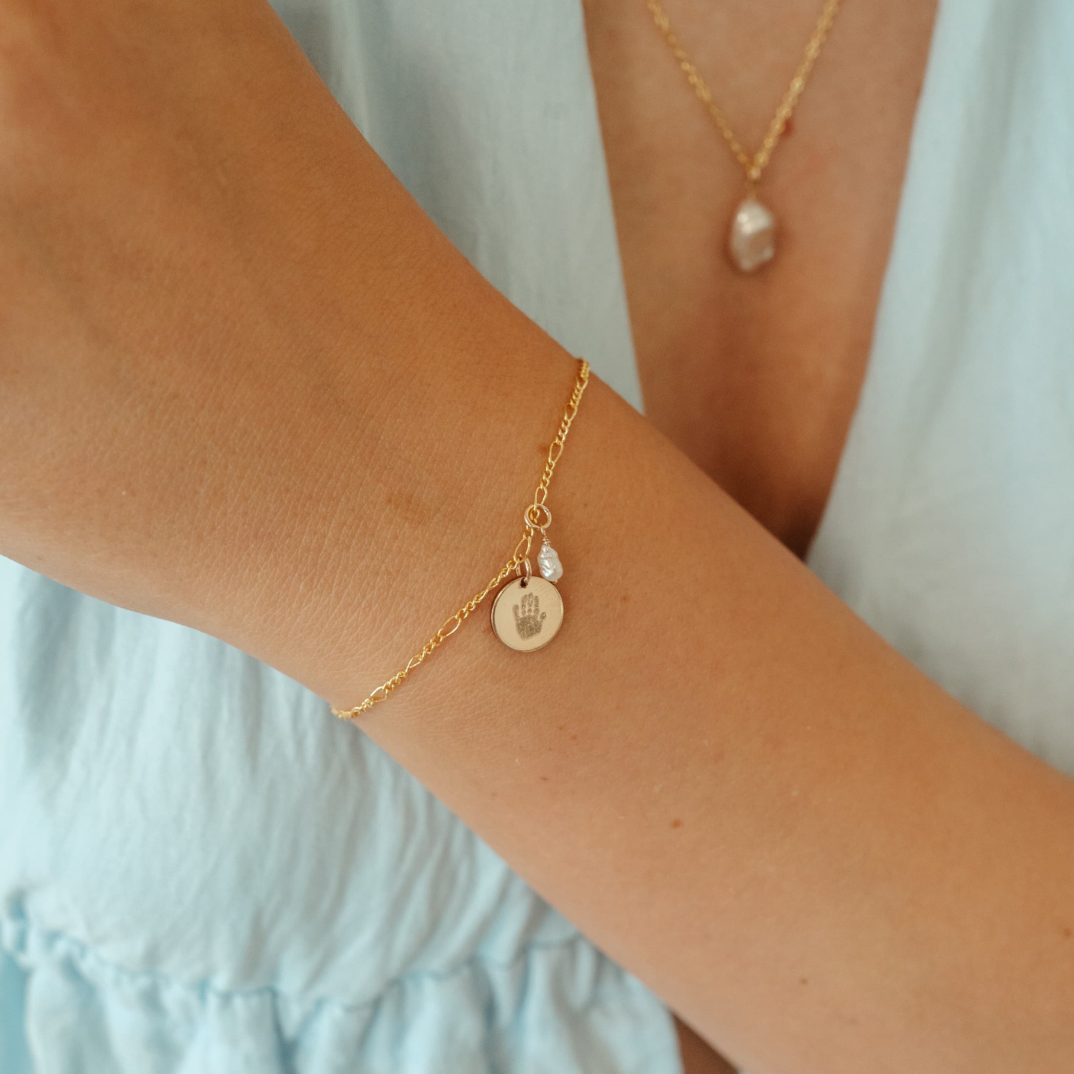 Armband hanger rond met barok parel